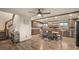Open concept kitchen featuring natural wood cabinets, stainless steel appliances, and hardwood floors at 11875 Maggie Ave, Las Vegas, NV 89166