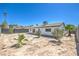 Backyard with mature trees and plants at 4012 Mira Ln, Las Vegas, NV 89108