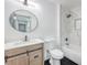 Bathroom has wood vanity, white marble tile, and a shower/tub combo at 4012 Mira Ln, Las Vegas, NV 89108