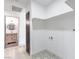 Laundry room has a decorative floor and is connected to a bathroom at 4012 Mira Ln, Las Vegas, NV 89108