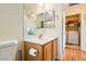 Half bathroom including sink, toilet, and closet with washer-dryer units at 5536 Baccarat Ave # 101, Las Vegas, NV 89122