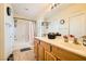 Bright bathroom featuring a tub/shower combination and ample counter space at 5536 Baccarat Ave # 101, Las Vegas, NV 89122