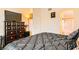 View of a bedroom leading into the bathroom at 5536 Baccarat Ave # 101, Las Vegas, NV 89122
