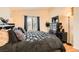 Nicely appointed bedroom featuring window, dresser and warm accents at 5536 Baccarat Ave # 101, Las Vegas, NV 89122