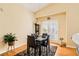 Dining room featuring hardwood floors, a marble top table, and decorous decorations at 5536 Baccarat Ave # 101, Las Vegas, NV 89122