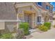 Charming townhome entrance with colorful landscaping and a convenient location at 5536 Baccarat Ave # 101, Las Vegas, NV 89122