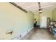 An empty garage showing ample space with a gathering rug by the exit door at 5536 Baccarat Ave # 101, Las Vegas, NV 89122