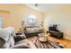 Bright living room with vaulted ceilings, ample seating, and a large window at 5536 Baccarat Ave # 101, Las Vegas, NV 89122