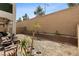 Spacious backyard with potential for landscaping, surrounded by a block wall for privacy at 8107 Skye Sweep St, Las Vegas, NV 89166