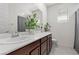 Bright bathroom with double sinks and stylish vanity at 8107 Skye Sweep St, Las Vegas, NV 89166