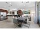 Modern kitchen and dining area with stainless steel appliances and large table at 8107 Skye Sweep St, Las Vegas, NV 89166