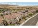 Beautiful two-story home with a well-manicured lawn, driveway, and a serene suburban neighborhood setting at 8107 Skye Sweep St, Las Vegas, NV 89166
