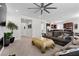 Open-concept living room offers a seamless flow, complemented by stylish furnishings and abundant natural light at 8107 Skye Sweep St, Las Vegas, NV 89166