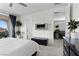Comfortable main bedroom with carpet flooring, ceiling fan, and access to an outdoor balcony at 8107 Skye Sweep St, Las Vegas, NV 89166