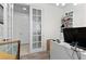 Bright office featuring glass French doors and modern desk at 8107 Skye Sweep St, Las Vegas, NV 89166