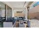Cozy outdoor patio with a fire pit and comfortable seating area at 8107 Skye Sweep St, Las Vegas, NV 89166