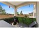 Covered outdoor patio featuring lounge chairs and mountain views, perfect for relaxation at 8107 Skye Sweep St, Las Vegas, NV 89166