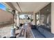 Relaxing outdoor patio with comfortable seating and a fire pit at 8107 Skye Sweep St, Las Vegas, NV 89166