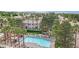 Relax at the community pool with lounge chairs and lush landscaping, perfect for enjoying sunny days at , Henderson, NV 89012