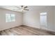 Bedroom with wood-look floors and walk in closet at 10085 S Riley St, Las Vegas, NV 89178