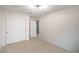Bedroom with plush carpeting and a closet with sliding doors at 10085 S Riley St, Las Vegas, NV 89178