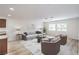 Spacious living room with natural light, ceiling fan, and open layout at 10085 S Riley St, Las Vegas, NV 89178