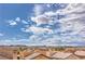 Scenic view of the mountain range from the rooftop, complemented by the cityscape and blue sky at 10085 S Riley St, Las Vegas, NV 89178