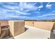 Wide rooftop deck offers potential for outdoor relaxation with views, partial wall, and neutral stucco finish at 10085 S Riley St, Las Vegas, NV 89178