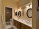 A bathroom features double sinks with modern fixtures and ample counter space for convenience at 2022 Big Bend Way, Henderson, NV 89074