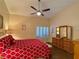 A beautiful bedroom features a ceiling fan and stylish decor for a comfortable living space at 2022 Big Bend Way, Henderson, NV 89074