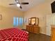 Bedroom featuring vaulted ceiling, ceiling fan, hardwood floors and abundant natural light at 2022 Big Bend Way, Henderson, NV 89074