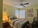 This bedroom features a ceiling fan, offering a relaxing space to retreat and unwind at 2022 Big Bend Way, Henderson, NV 89074