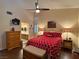 Comfortable primary bedroom with a vaulted ceiling, fan, and natural light at 2022 Big Bend Way, Henderson, NV 89074