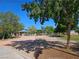 Playgrounds and picnic areas in Silver Springs community park with mature trees at 2022 Big Bend Way, Henderson, NV 89074
