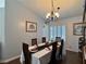 Dining room featuring seating for six, hardwood floors, and bright natural light at 2022 Big Bend Way, Henderson, NV 89074