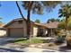 Charming single-story home featuring a two-car garage and nicely landscaped front yard at 2022 Big Bend Way, Henderson, NV 89074