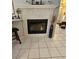 Close-up of mosaic tile fireplace with adjacent breakfast bar in modern living space at 2022 Big Bend Way, Henderson, NV 89074