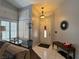 Inviting foyer with tiled floor, large window with shutters, and decorative accents providing a warm entry at 2022 Big Bend Way, Henderson, NV 89074