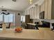 Kitchen area featuring light-colored cabinets, stainless appliances and eat-in breakfast nook at 2022 Big Bend Way, Henderson, NV 89074