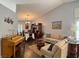 Comfortable living room with elegant furnishings and view into the dining room at 2022 Big Bend Way, Henderson, NV 89074