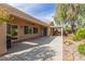Spacious covered patio and pergola extends to the landscaped backyard and hot tub at 2489 Black River Falls Dr, Henderson, NV 89044