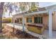 Backyard with pergola covered hot tub, drought resistant foliage, and shaded patio at 2489 Black River Falls Dr, Henderson, NV 89044