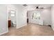 Bonus room with tile floor, ceiling fan, and kitchenette with private bathroom at 2489 Black River Falls Dr, Henderson, NV 89044