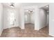 Bright entryway with tile flooring and a view into the home's interior spaces at 2489 Black River Falls Dr, Henderson, NV 89044