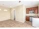 This flex room has tile floors, neutral paint, mini fridge, microwave, and sink at 2489 Black River Falls Dr, Henderson, NV 89044