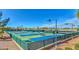 Well-maintained tennis courts offer a recreational space for active community members at 2489 Black River Falls Dr, Henderson, NV 89044