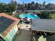 This backyard features a pool, fire pit, and patio area with pergola at 2807 Camelback Ln, Henderson, NV 89074