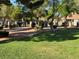 Expansive community green space with walking paths, manicured landscaping, and a secure gated perimeter at 2807 Camelback Ln, Henderson, NV 89074