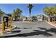 Gated community entrance providing privacy and security, with well-maintained landscaping and clear signage at 523 Crimson View Pl, Las Vegas, NV 89144