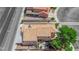 Bird's eye view of the property, showing the roof, small patio, and surrounding street at 6536 Castor Tree Way, Las Vegas, NV 89108